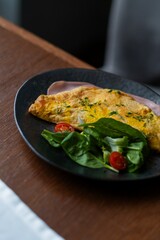 Omelet with ham and spinach