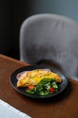 Omelet with ham and cheese