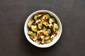 Oven roasted zucchini with garlic and greens