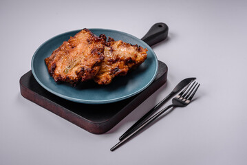 Delicious fresh crispy chicken grilled with salt, spices and herbs