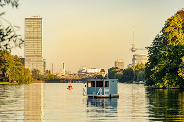 Boats and houseboats anchoring on rummelsburg lake in Berlin, Germany
