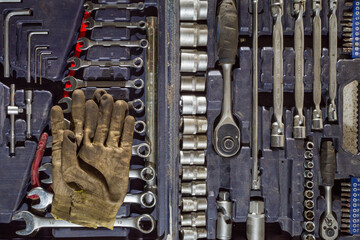 a dusty long-used working set of car repair tools. car repair and maintenance