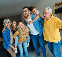 child family portrait woman mother man father grandmother daughter group happy girl grandparent...