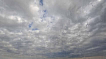 raining on sky with clouds - pretty weather bg - photo of nature