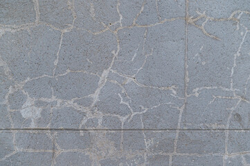 imagen detalle textura suelo de cemento lleno de grietas 