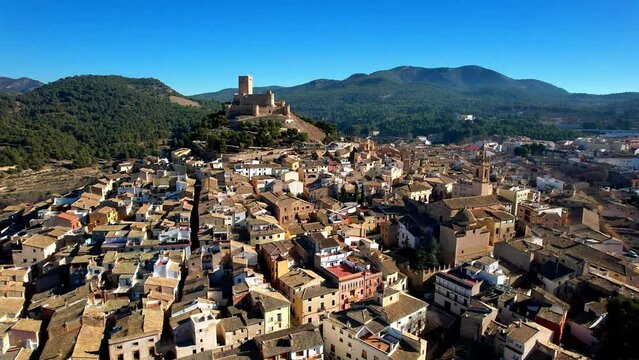 medieval Town Biar in Spain and castle , Sierra de Mariola in the Vinalopo Valley in the province of Alicante . aerial drone 4k HD video