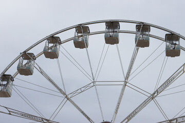 Ferris wheel on a grey sky