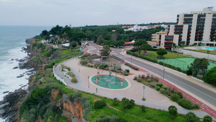 Aerial cozy hotel sea shore cloudy day. Place for relax vacation with ocean view