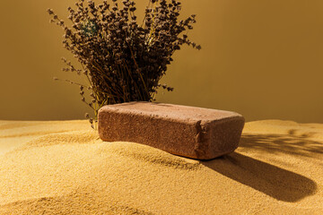 Sidewalk stones. Paving slabs sidewalk in desert sand on yellow background. Concept for advertising...