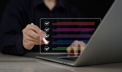Digital Assessment Concept : Businessman Uses Mobile for Evaluation, Survey Exam, Survey Completion, and Checklist or Fills Assessment Survey for Performance Checklist.