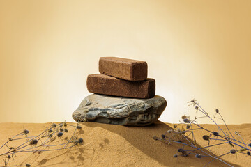 Sidewalk stones. Paving slabs sidewalk in desert sand on yellow background. Concept for advertising...