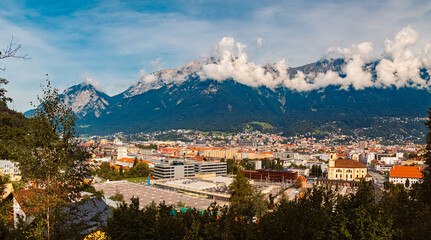 High resolution stitched alpine summer panorama with cloudy Nordkette mountains in the background...