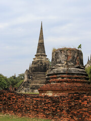 Fototapeta premium Destroyed pagoda being cut in half and burn from fire in Thailand
