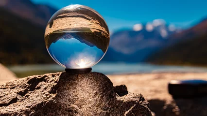 Fotobehang Chocoladebruin Crystal ball alpine landscape shot at the famous Kaunertal Glacier Road, Landeck, Tyrol, Austria  © Martin Erdniss