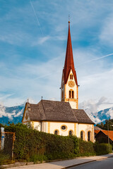 Fototapeta na wymiar Church on a sunny summer day at the famous Stubaital valley, Innsbruck, Austria