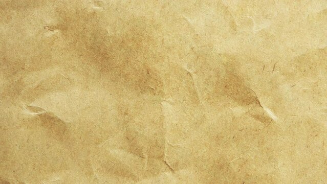 Crumpled craft paper background, wallpaper stop motion animation