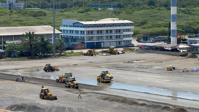 Construction site at Magampura Mahinda Rajapaksa Cruise Port with road roller, Sri Lanka