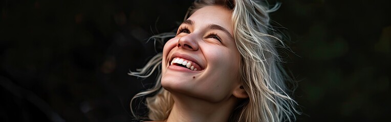 Banner with smiling young blond woman on black background