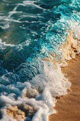Aerial view of a beach with a blue wave