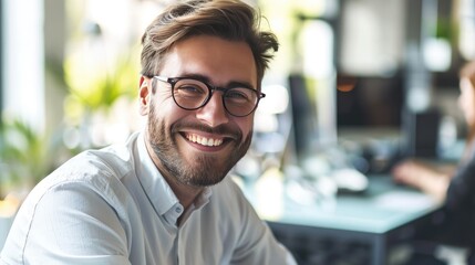 Happy smiling businessman in office