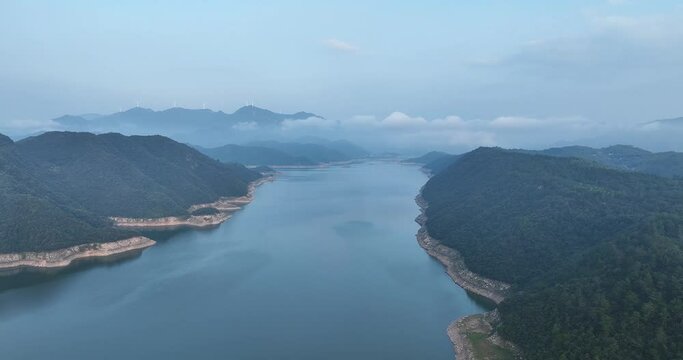green mountains and river in mist