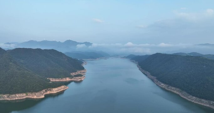 green mountains and river in mist