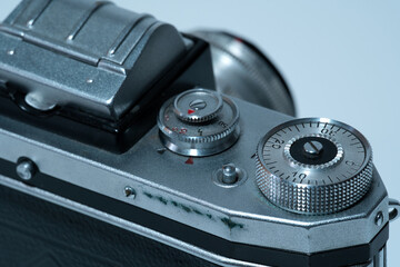 Close-up of the exposure time wheel and film advance on an old SLR camera