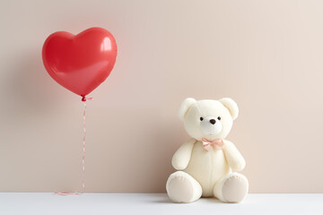 Teddy bear with heart-shaped balloon on white background