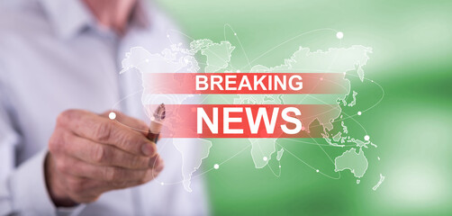 Man touching a breaking news concept