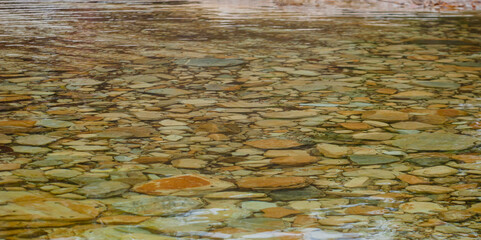 Dragging along the river transforming the quartzite slabs into pebbles in one of the valleys high up in the mountains of Minas Gerais.