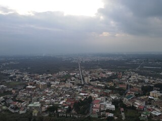 Obraz premium A panoramic view of a small town, nestled in the mountains, in southern Italy