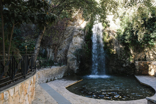 Waterfall at the Font de La Favara public park in La Nucia town, Alicante province, Spain