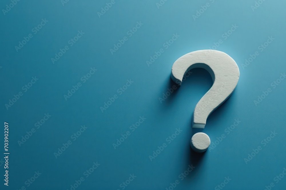 Poster bold white question mark on a blue background, creating a strong visual for concepts of doubt.