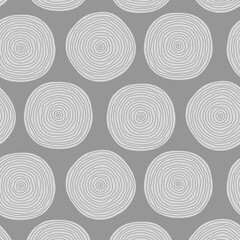 Seamless gray background of big freehand polka dots with concentric rings texture. Abstract doodle modern pattern for prints and decoration.