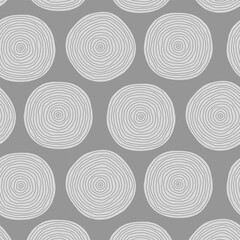 Seamless gray background of big freehand polka dots with concentric rings texture. Abstract doodle modern pattern for prints and decoration.