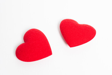 Love, Valentine day symbol, design element. Two heart red color wood isolated on white. Wooden texture heart shape decoration