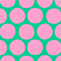 Seamless pattern of big irregular pink circles with concentric rings texture on green backdrop. Freehand doodle modern background for prints and decoration.