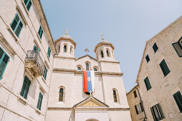 Fototapeta na wymiar Facade and bell towers of the Church of St. Nicholas. Kotor, Montenegro