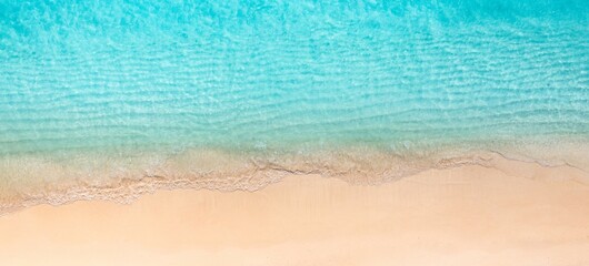 Sunny gold sandy beach, panorama. Panoramic view tranquil sandy beach. Peaceful sea waves shore. Ocean coast view. Aerial photography beachfront. Seaside exotic tropical Mediterranean nature landscape