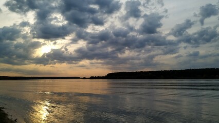 Sunset on the river with beautiful clouds