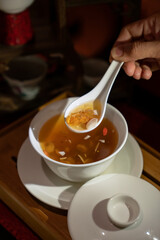 Chinese traditional soup with herbs, meat and Chinese medicine.