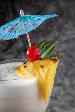 Pina Colada Cocktail on dark background