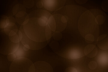 Dark warm brown abstract bokeh background. Soft brown backdrop with soft focus lights in background.