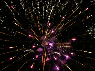 Obraz premium Colorful fireworks on the night black sky