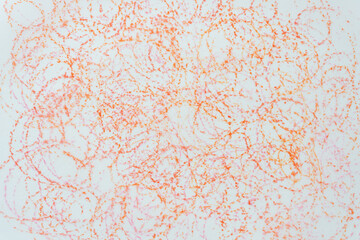 curly, mostly orange color pencil texture on tracing paper