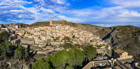 Poster One of the most beautiful ancient villages of Spain - scenic Bocairent , Valencia provice. Aerial drone high angle view © Freesurf