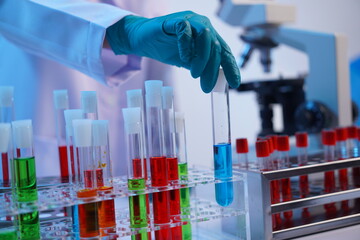 Science test tubes, laboratory equipment for new medical research, microbiology research with small...