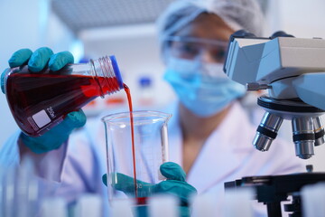 Science test tubes, laboratory equipment for new medical research, microbiology research with small...