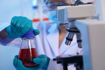 Science test tubes, laboratory equipment for new medical research, microbiology research with small...