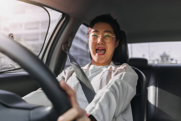 Asian Thai woman driving on road, screaming shocking of car accident crashing. - obrazy, fototapety, plakaty